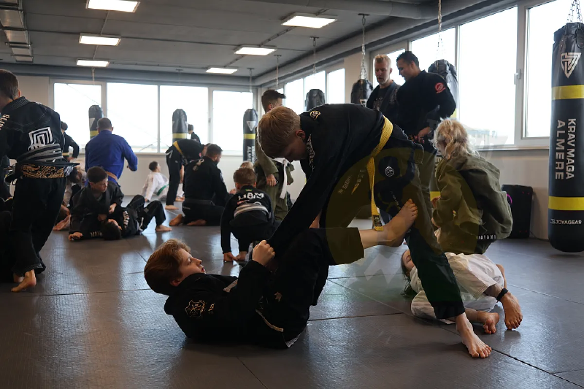 Photo from TAKEDOWNS & DE LA RIVA
