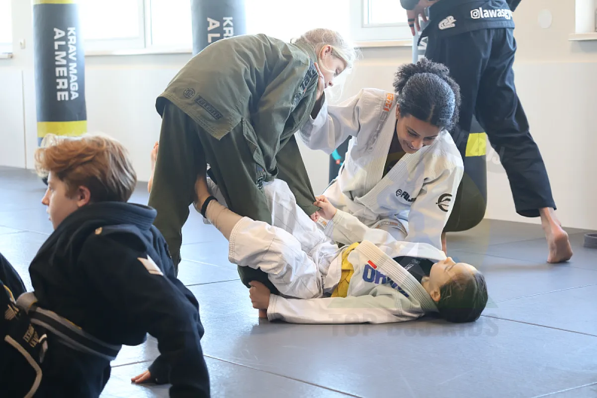 Photo from TAKEDOWNS & DE LA RIVA